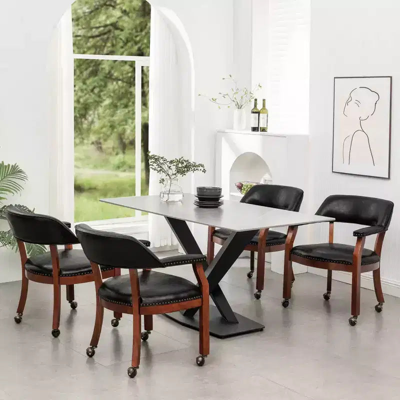 Poltrona in pelle vegana con ruote – Struttura in legno espresso e borchie decorative