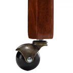 Poltrona in pelle vegana con ruote – Struttura in legno espresso e borchie decorative